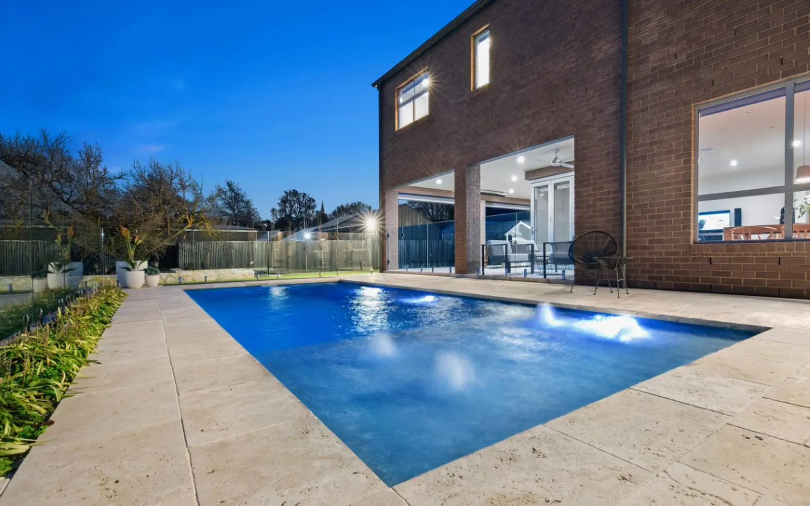 Leisure Pools Reflection fibreglass swimming pool with splash deck