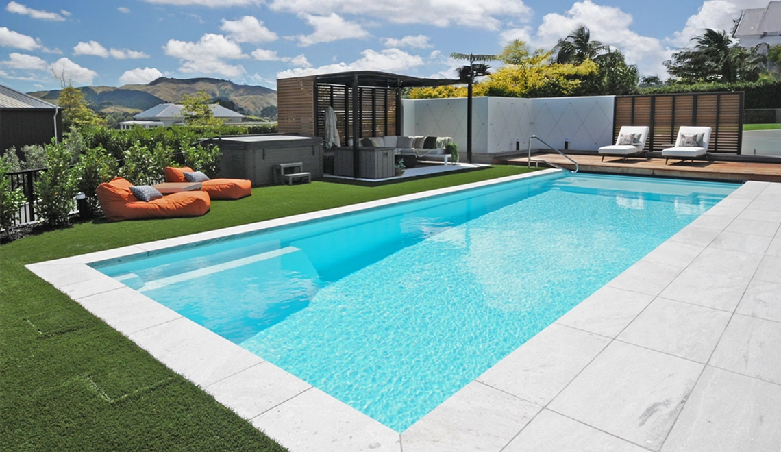 The Acclaim 12.00m in Shimmer White installed by NZ Pools